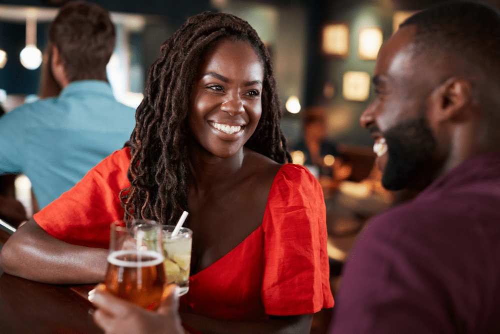 Photo of a Couple Enjoying Drinks. Romance in Fredericksburg, TX, is a Natural Occurrence.