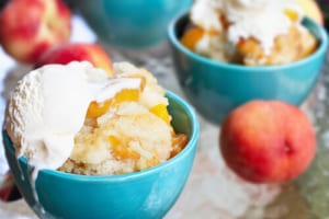 Fredericksburg Peach offers up some tasty peach seaonsal dishes, like this peach cobbler with ice cream.